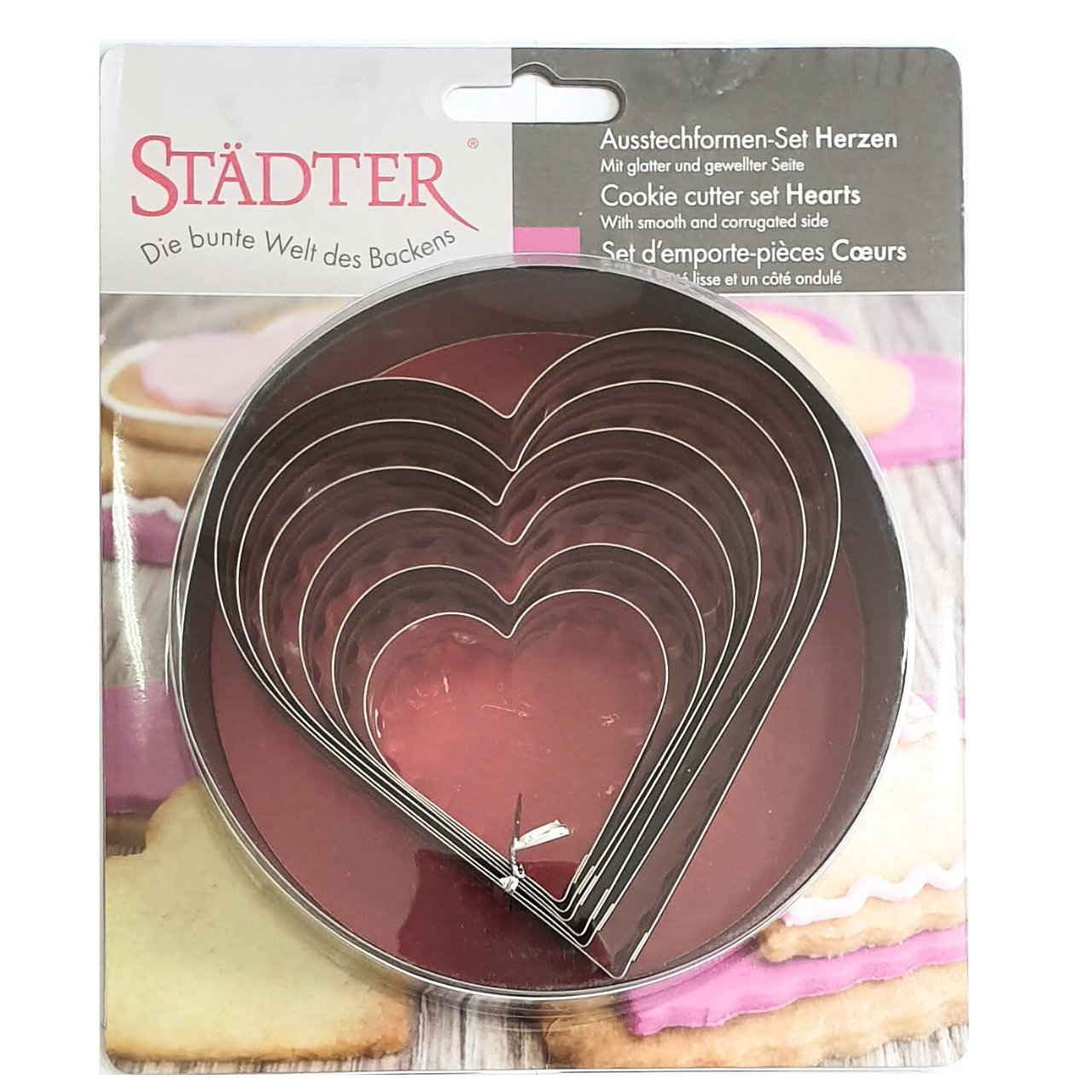 Set of 6 stainless steel heart cookie cutters in packaging.